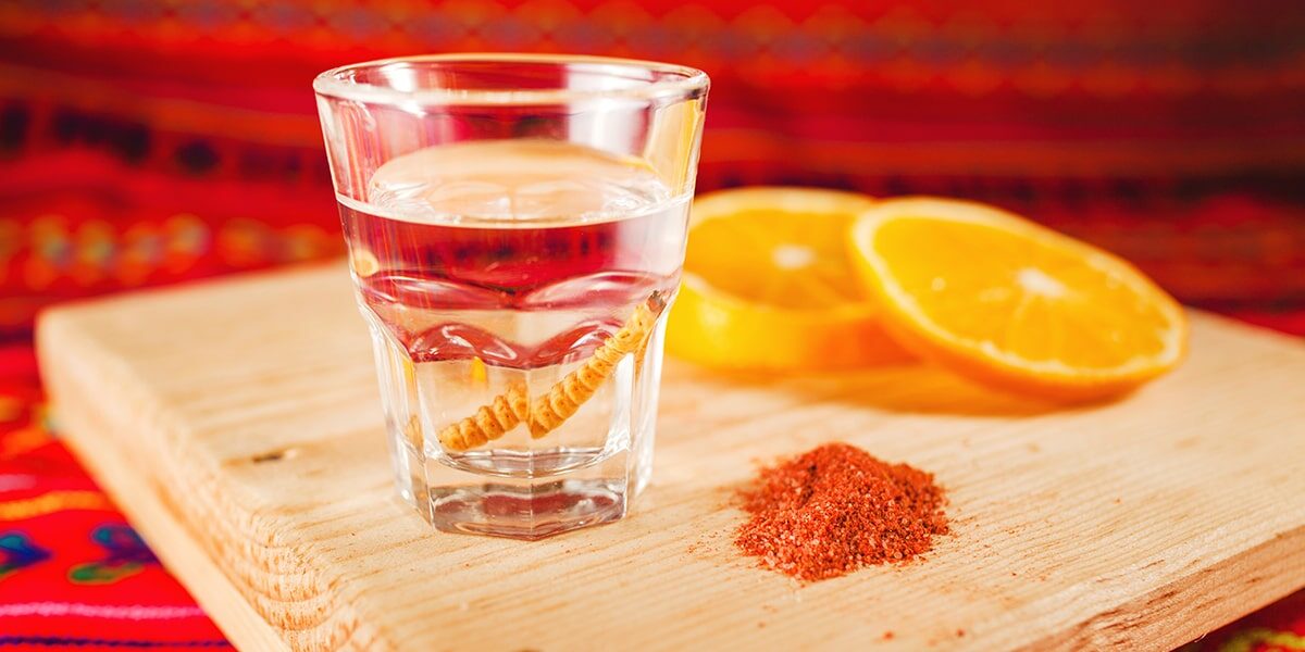 Mezcal drink with orange slices
