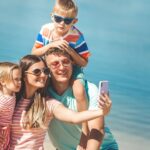 Family Taking Selfie on the Beach